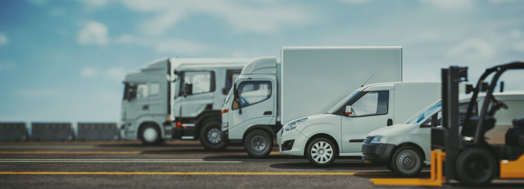 trucks of various sizes on the road. 3d render and illustration.