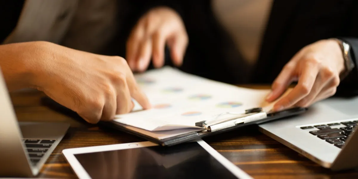 business approve and certificate concept, confirmation of business marketing document permit and certified stamping, signing on business partner paper