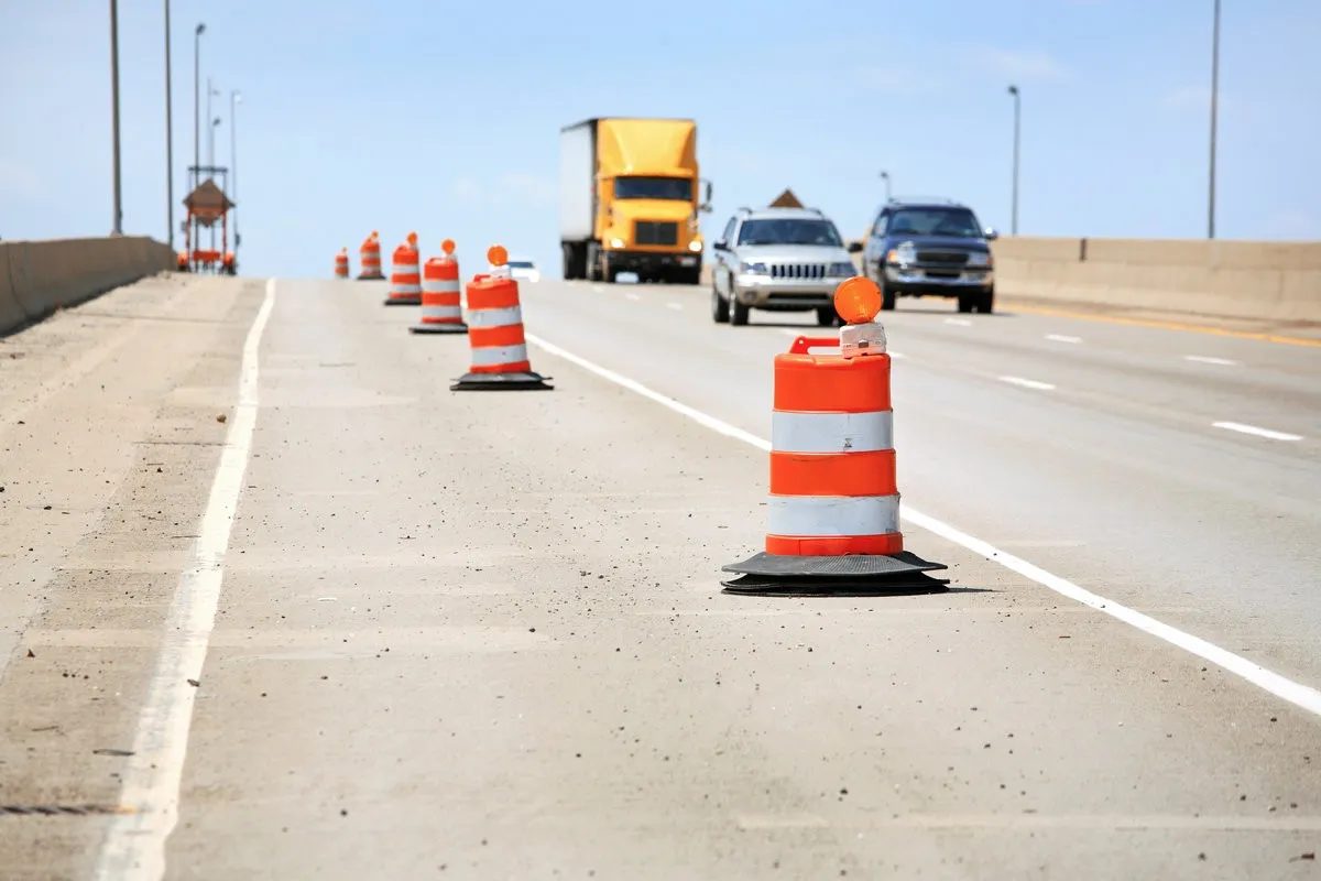 Orange barrels along the highway during construction