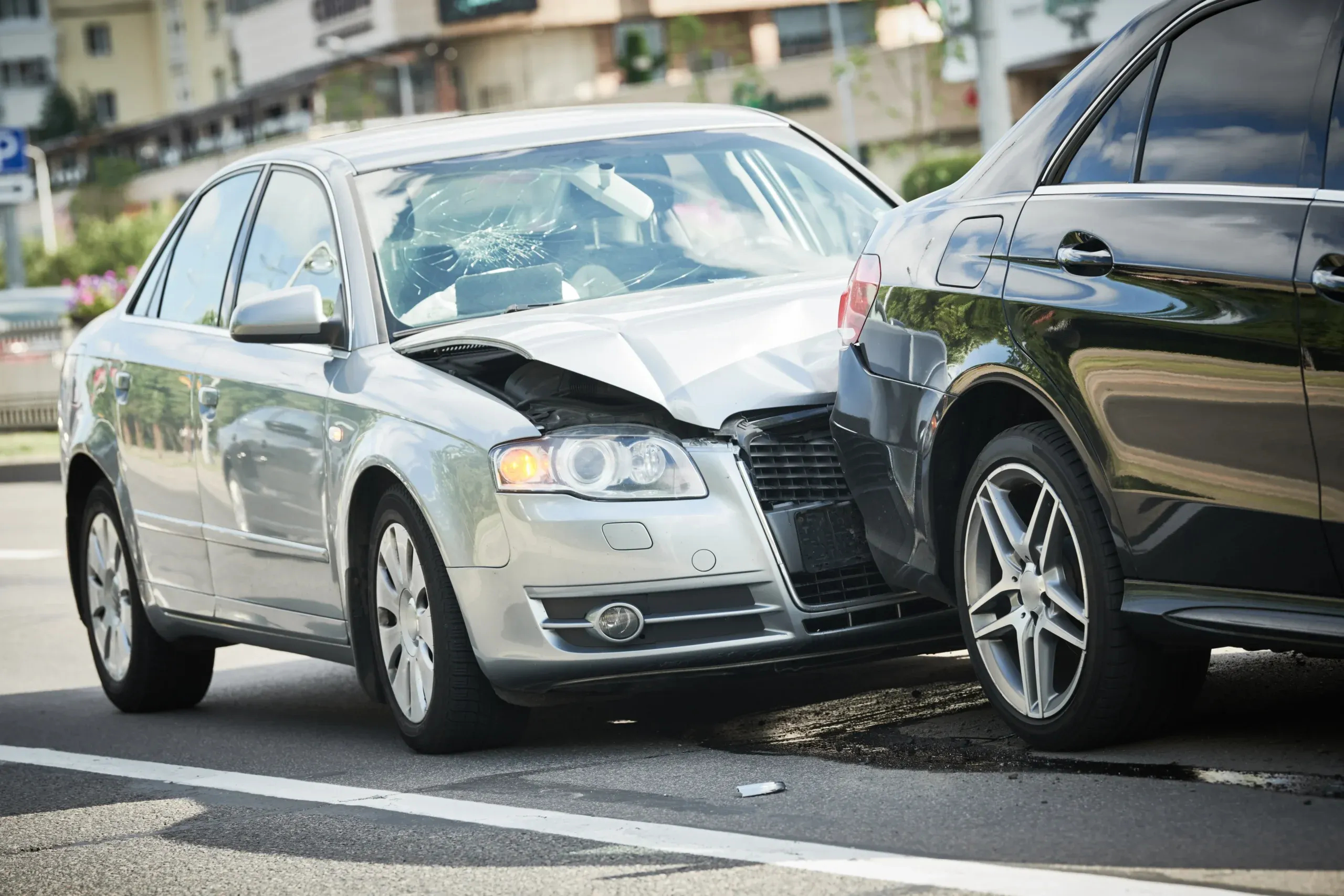 car crash accident on street. damaged automobiles