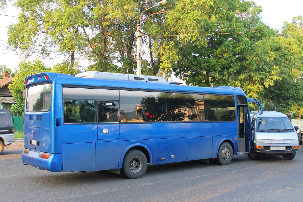 Traffic accident big bus collided with a small minibus.