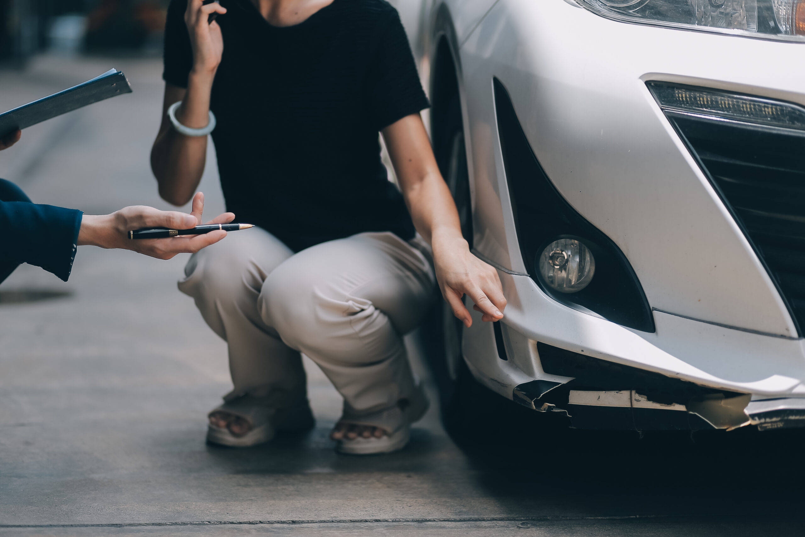 Woman reviewing uninsured motorist car insurance coverage options after a Tampa hit-and-run